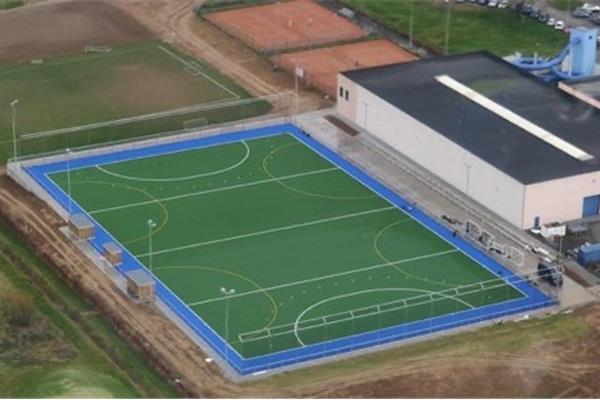 Aanleg kunstgras hockeyveld (type waterveld) en kunstgras voetbalveld - Sportinfrabouw NV